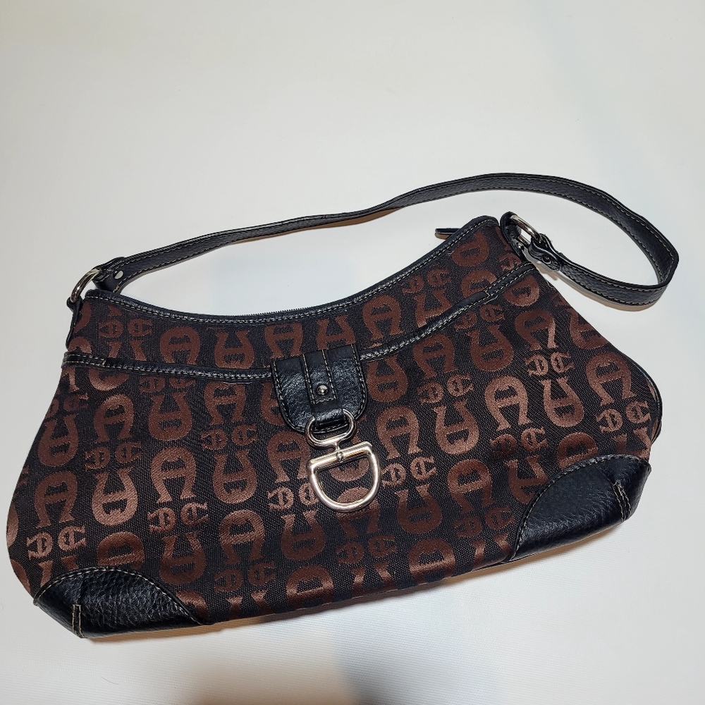 Brown Aigner Purse zipper closure, 2 outside pockets inside zipper/open pocket